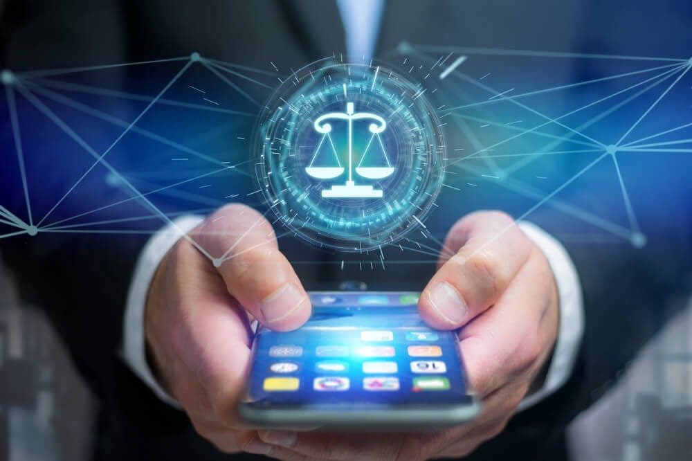 personal injury law mobile_View of a justice balance icon on a futuristic interface