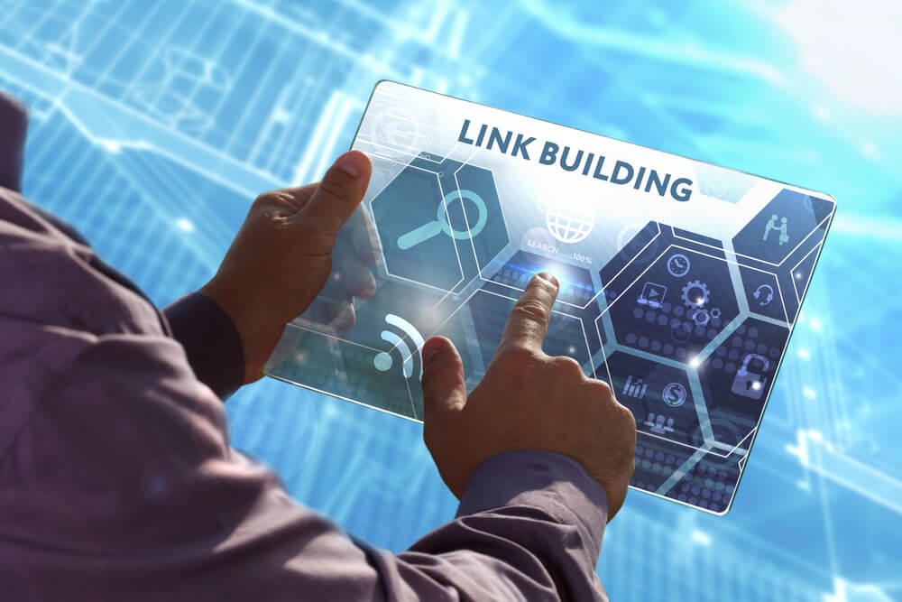link building_Business, Technology, Internet and network concept . Young business man working on the tablet of the future , select the virtual screen: Link building