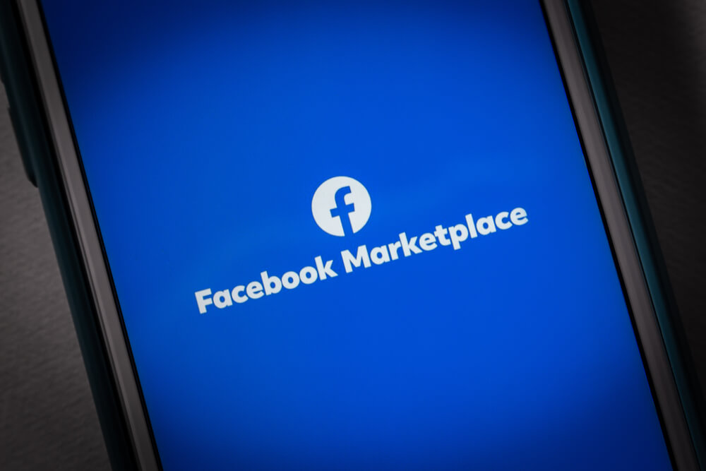 facebook marketplace_Kumamoto, JAPAN - Jun 14 2021 : The closeup logo of Facebook Marketplace, a digital marketplace allows users to discover, buy and sell items, on iPhone screen.