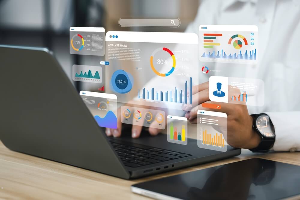 KPI metrics_An analyst uses a computer and dashboard for data business analysis and Data Management System with KPI and metrics connected to the database for technology finance, operations, sales, marketing