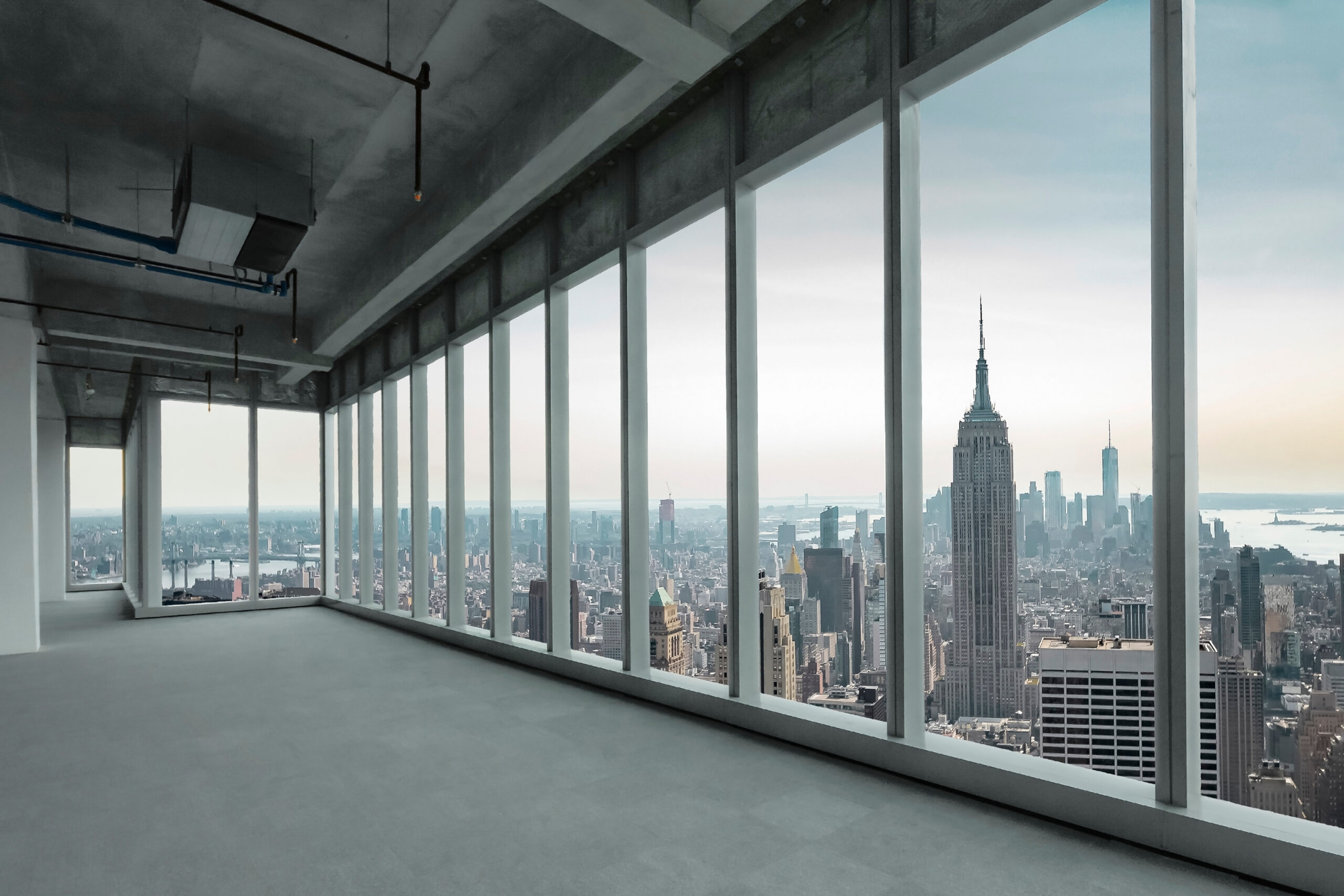 Wall-to-wall windows look out at the skyline, the office is ready to maximize ROI with New York FCMOs